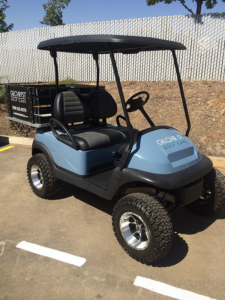 Club Car Precedent, lifted with flat bed